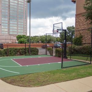 The hotel’s basketball court provides the chance to stay fit in the fresh air and is separated from the car park with fencing.