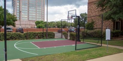 The hotel’s basketball court provides the chance to stay fit in the fresh air and is separated from the car park with fencing.