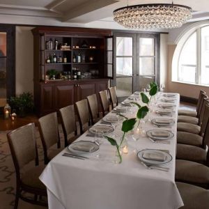 The Benjamin Royal Sonesta New York’s corner room offers white tablecloth dining in a chic setting, with plenty of natural light and a glittering chandelier.