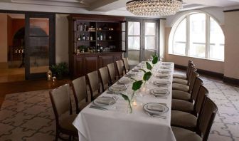 The Benjamin Royal Sonesta New York’s corner room offers white tablecloth dining in a chic setting, with plenty of natural light and a glittering chandelier.