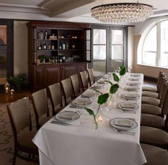 The Benjamin Royal Sonesta New York’s corner room offers white tablecloth dining in a chic setting, with plenty of natural light and a glittering chandelier.