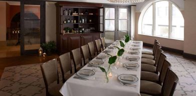 The Benjamin Royal Sonesta New York’s corner room offers white tablecloth dining in a chic setting, with plenty of natural light and a glittering chandelier.