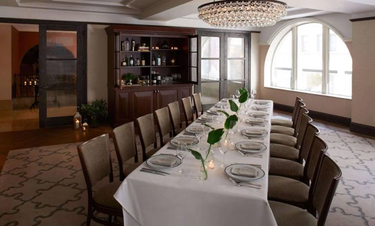 The Benjamin Royal Sonesta New York’s corner room offers white tablecloth dining in a chic setting, with plenty of natural light and a glittering chandelier.