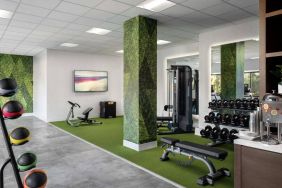 Sonesta Irvine’s fitness center is equipped with both exercise machines and free weights, in addition to gym balls and nature-themed decor.