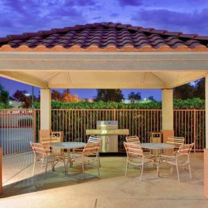 Sonesta Simply Suites Phoenix Tempe’s gazebo features barbecue facilities next to which are tables and chairs where guests can dine and socialize.