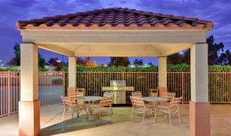 Sonesta Simply Suites Phoenix Tempe’s gazebo features barbecue facilities next to which are tables and chairs where guests can dine and socialize.