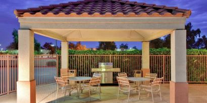 Sonesta Simply Suites Phoenix Tempe’s gazebo features barbecue facilities next to which are tables and chairs where guests can dine and socialize.