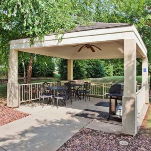 Sonesta Simply Suites Atlanta Gwinnett Place’s gazebo has a ceiling fan, barbecue, and tables and chairs where guests can dine and socialize.