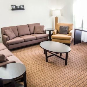 Lobby and lounge ideal for coworking at Sleep Inn Tinley Park.