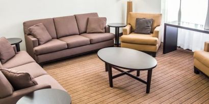 Lobby and lounge ideal for coworking at Sleep Inn Tinley Park.