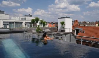 Relaxing rooftop pool at Wilmina Hotel.