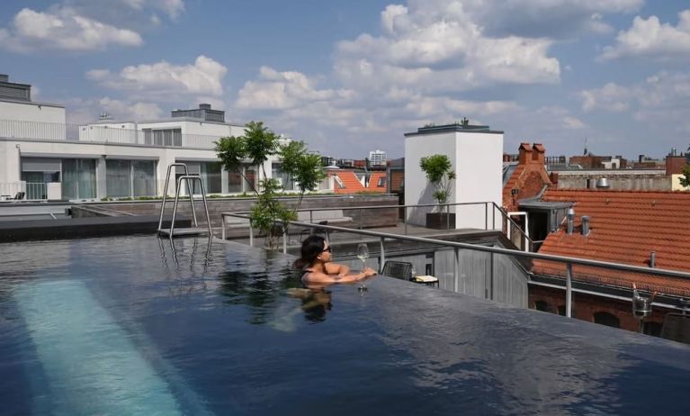 Relaxing rooftop pool at Wilmina Hotel.