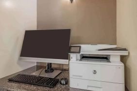 The hotel’s business center includes a computer workstation and a printer.