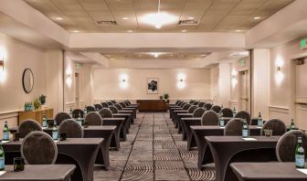 Royal Sonesta Portland Downtown meeting room, with tables arranged in a classroom format and seating for dozens of attendees.