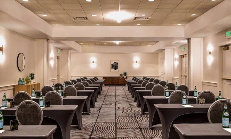 Royal Sonesta Portland Downtown meeting room, with tables arranged in a classroom format and seating for dozens of attendees.