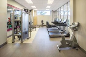 Sonesta Milwaukee West Wauwatosa’s fitness center is equipped with gym balls and various types of exercise machines.