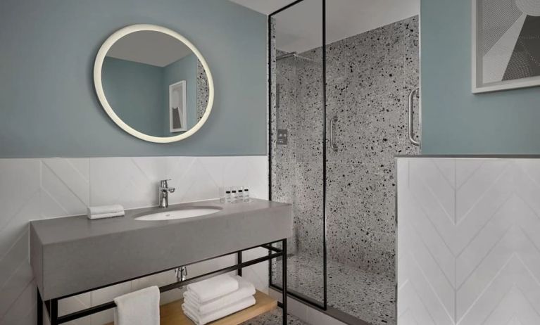 Guest bathroom with shower at Sheraton Amsterdam Airport Hotel And Conference Center.