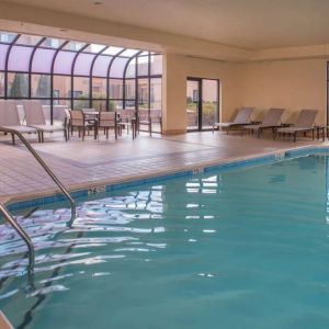 Sonesta Select Columbia’s indoor pool has large windows for plenty of light, and both loungers and chairs by the side.