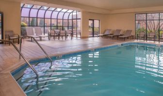 Sonesta Select Columbia’s indoor pool has large windows for plenty of light, and both loungers and chairs by the side.