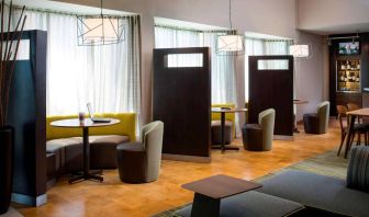 Sonesta Select Boca Raton’s media pods provide cozy nooks for co-working, each equipped with a coffee table and comfy seating right by a window.