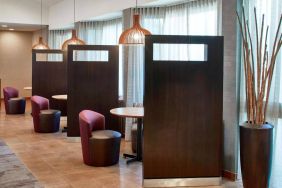 The hotel’s media pods are cozy nooks for socializing or co-working, with comfy seats and coffee tables by the windows.