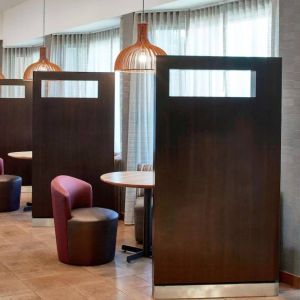 The hotel’s media pods are cozy nooks for socializing or co-working, with comfy seats and coffee tables by the windows.