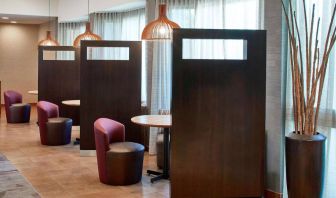 The hotel’s media pods are cozy nooks for socializing or co-working, with comfy seats and coffee tables by the windows.