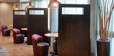 The hotel’s media pods are cozy nooks for socializing or co-working, with comfy seats and coffee tables by the windows.