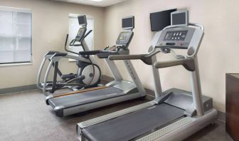 The hotel’s fitness center is equipped with various types of exercise machine, and has a wall-mounted television.