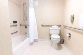 Sonesta ES Suites San Antonio Downtown Alamo Plaza guest bathroom, with shower-equipped bath, and a lavatory.