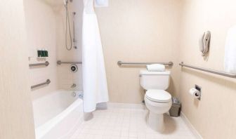 Sonesta ES Suites San Antonio Downtown Alamo Plaza guest bathroom, with shower-equipped bath, and a lavatory.