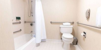 Sonesta ES Suites San Antonio Downtown Alamo Plaza guest bathroom, with shower-equipped bath, and a lavatory.