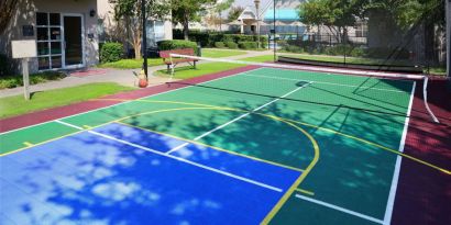 The hotel’s sports court is suitable for multiple activities including basketball and tennis, and has a bench for spectators.