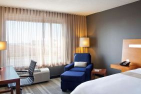 Delux king room with natural light at Novotel Toronto Vaughan Centre.