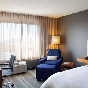 Delux king room with natural light at Novotel Toronto Vaughan Centre.