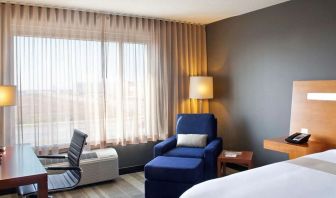 Delux king room with natural light at Novotel Toronto Vaughan Centre.