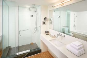 Guest bathroom with showerr at Novotel Toronto Vaughan Centre.