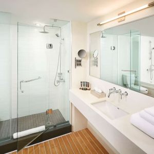 Guest bathroom with showerr at Novotel Toronto Vaughan Centre.