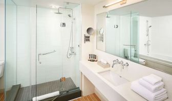 Guest bathroom with showerr at Novotel Toronto Vaughan Centre.