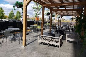 Outdoor lounge and dining space at Novotel Toronto Vaughan Centre.