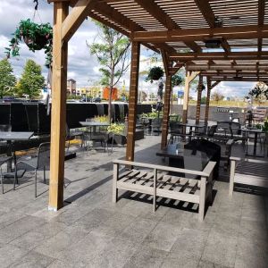 Outdoor lounge and dining space at Novotel Toronto Vaughan Centre.