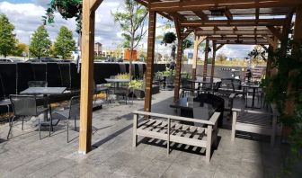 Outdoor lounge and dining space at Novotel Toronto Vaughan Centre.