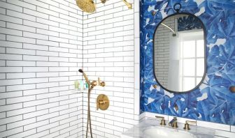 Guest bathroom with shower at Hotel Figueroa.