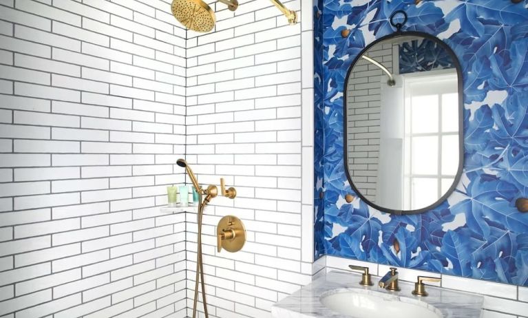 Guest bathroom with shower at Hotel Figueroa.