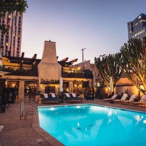 Outdoor pool at night at Hotel Figueroa.