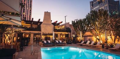 Outdoor pool at night at Hotel Figueroa.