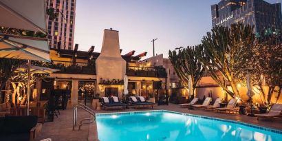 Outdoor pool at night at Hotel Figueroa.