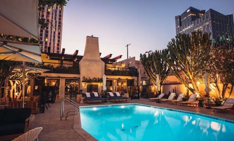 Outdoor pool at night at Hotel Figueroa.