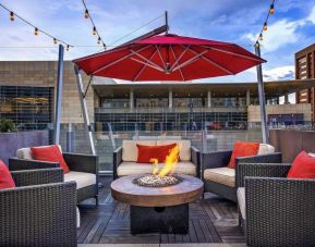 Outdoor lounge and fire pit at The Art Hotel Denver.