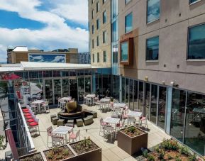 Stunning outdoor lounge and dining space at The Art Hotel Denver.